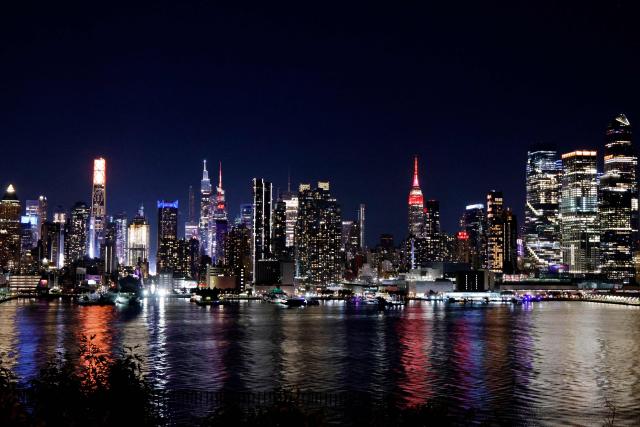 The Empire State Building is lit up in the colors of the Spanish flag after Spain won the 2026 World Cup Final football match against Argentina, in New York on July 19, 2026. (Photo by Leonardo Munoz / AFP)