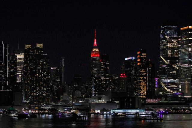 The Empire State Building is lit up in the colors of the Spanish flag after Spain won the 2026 World Cup Final football match against Argentina, in New York on July 19, 2026. (Photo by Leonardo Munoz / AFP)
