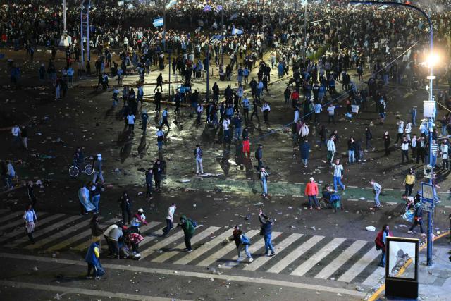 Argentina's fans clash with riot police at the Obelisk after Argentina lost the FIFA World Cup final football match against Spain in Buenos Aires on July 19, 2026. Spain won by 1-0. (Photo by Luis ROBAYO / AFP)