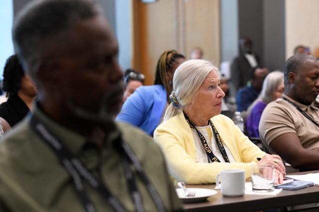 NAACP members attend the panel "On the Front Lines: State Attorneys General Fighting for Accountability and Justice" during the 117th NAACP National Convention, held under the theme “We, The People,” at McCormick Place in Chicago, Illinois, on July 19, 2026. The convention brings together advocates and leaders to discuss civil rights, equality and democracy. (Photo by Octavio Jones / AFP)