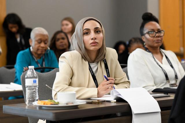 NAACP members attend the panel "On the Front Lines: State Attorneys General Fighting for Accountability and Justice" during the 117th NAACP National Convention, held under the theme “We, The People,” at McCormick Place in Chicago, Illinois, on July 19, 2026. The convention brings together advocates and leaders to discuss civil rights, equality and democracy. (Photo by Octavio Jones / AFP)