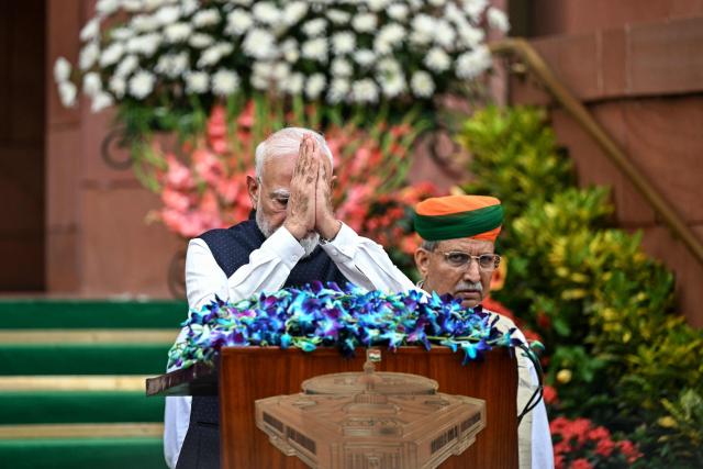 India's Prime Minister Narendra Modi greets the media on the first day of the monsoon session of the parliament in New Delhi on July 20, 2026. (Photo by Sajjad HUSSAIN / AFP)