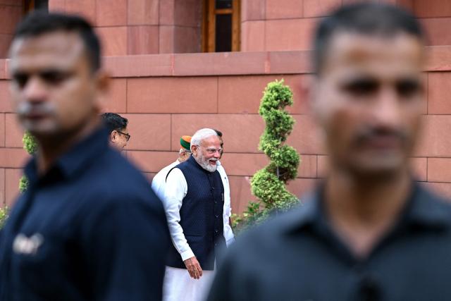India's Prime Minister Narendra Modi (C) arrives to address the media on the first day of the monsoon session of the parliament in New Delhi on July 20, 2026. (Photo by Sajjad HUSSAIN / AFP)