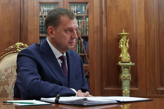 In this pool photograph distributed by the Russian state agency Sputnik, Yevgeny Balitsky, Moscow-installed leader of the Russian-controlled parts of the Zaporizhzhia region, meets with Russia's President at the Kremlin in Moscow on July 20, 2026. (Photo by Alexander KAZAKOV / POOL / AFP)