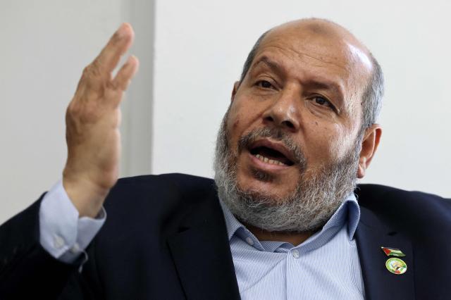 (FILES) Khalil al-Hayya, senior leader and top Hamas legislative candidate, gestures duringan interview with AFP at his office in Gaza City on April 21, 2021. Palestinian Islamist movement Hamas announced on July 20, 2026 that it had elected Khalil al-Hayya, the group's lead negotiator in indirect ceasefire talks with Israel, as the new head of its political bureau. (Photo by Emmanuel DUNAND / AFP)