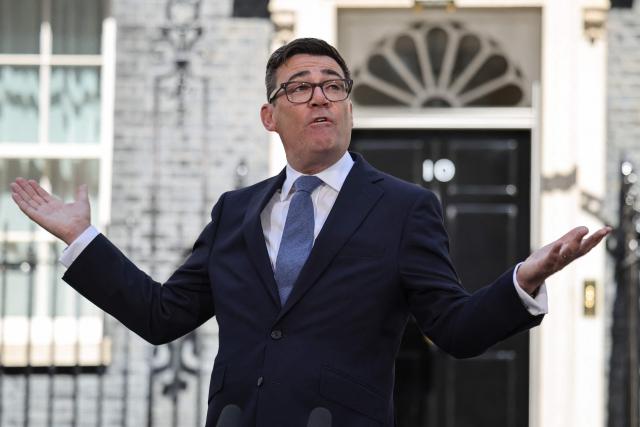 Britain's new Prime Minister Andy Burnham gives his first speech in front of 10 Downing Street in central London on July 20, 2026, after being asked by the king to form the next government. (Photo by Henry NICHOLLS / AFP)
