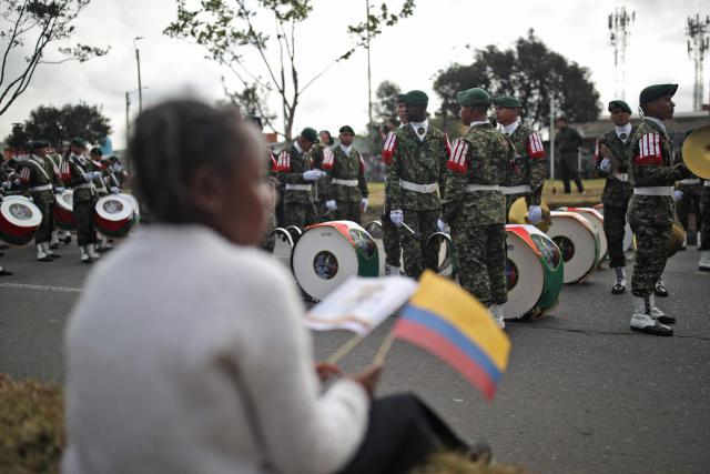 Military members wait to take part in a military parade commemorating Colombia's Independence Day in Bogota, on July 20, 2026. (Photo by ESTEBAN VEGA LA-ROTTA / AFP)