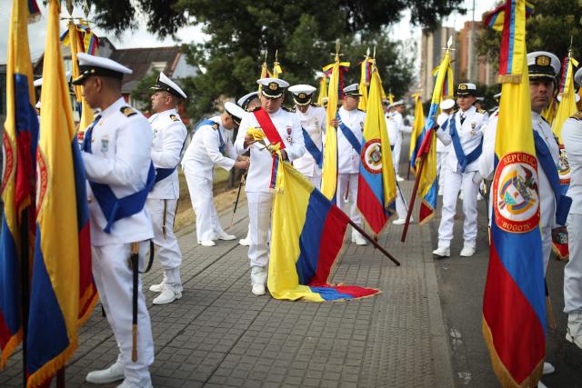 Military members wait to take part in a military parade commemorating Colombia's Independence Day in Bogota, on July 20, 2026. (Photo by ESTEBAN VEGA LA-ROTTA / AFP)