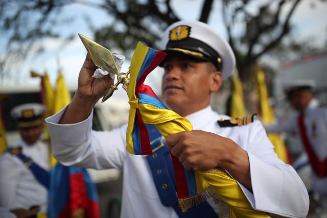 A military member prpares to take part in a military parade commemorating Colombia's Independence Day in Bogota, on July 20, 2026. (Photo by ESTEBAN VEGA LA-ROTTA / AFP)