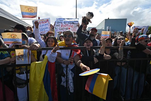 Supporters of Colombia's President Gustavo Petro wait for his speech and a military parade to commemorate Colombia's Independence Day in Bogota, on July 20, 2026. (Photo by LUIS ACOSTA / AFP)