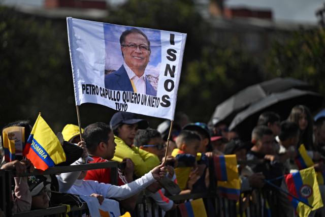 Supporters of Colombia's President Gustavo Petro wait for his speech and a military parade to commemorate Colombia's Independence Day in Bogota, on July 20, 2026. (Photo by LUIS ACOSTA / AFP)