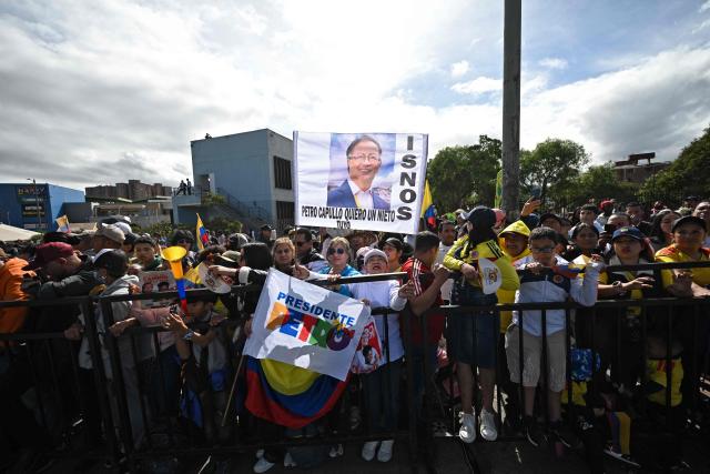 Supporters of Colombia's President Gustavo Petro wait for his speech and a military parade to commemorate Colombia's Independence Day in Bogota, on July 20, 2026. (Photo by LUIS ACOSTA / AFP)
