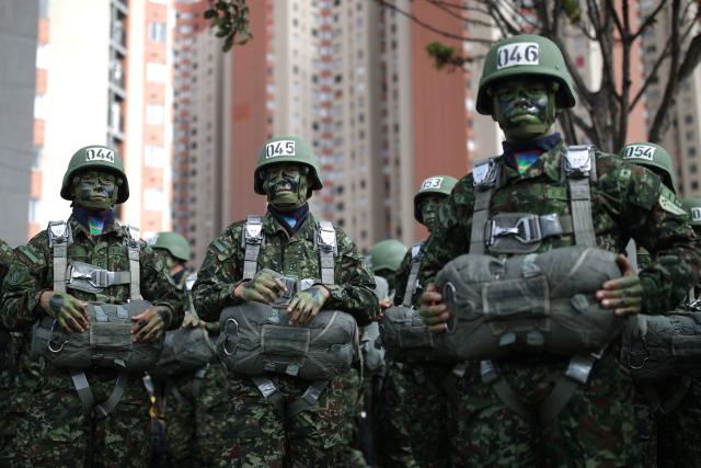 Military members prepare to take part in a military parade commemorating Colombia's Independence Day in Bogota, on July 20, 2026. (Photo by ESTEBAN VEGA LA-ROTTA / AFP)