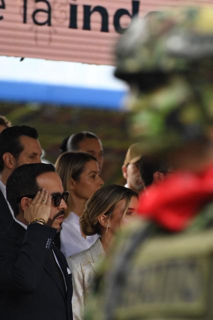 Colombia's president-elect Abelardo de la Espriella (L) salutes during a military parade commemorating Colombia's Independence Day in Medellin, Colombia, on July 20, 2026. (Photo by Jaime SALDARRIAGA / AFP)