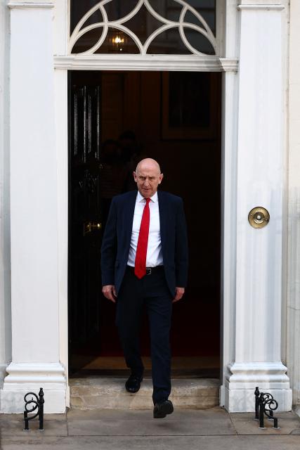 Britain's former Defence secretary John Healey leaves 11 Downing Street in London July 20, 2026 as cabinet appointments are being made after Andy Burnham became Britain's new Prime Minister. Britain's new Prime Minister Andy Burnham appointed John Healey, who was defence secretary under his predecessor, to the top job of finance minister, known as Chancellor of the Exchequer, Downing Street said Monday. (Photo by Peter Nicholls / AFP)