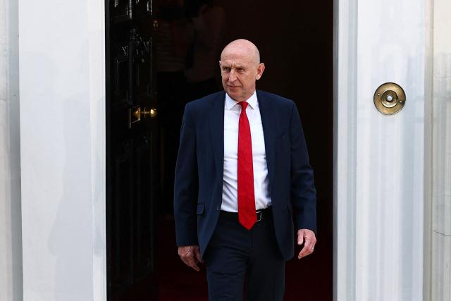 Britain's former Defence secretary John Healey leaves 11 Downing Street in London July 20, 2026 as cabinet appointments are being made after Andy Burnham became Britain's new Prime Minister. Britain's new Prime Minister Andy Burnham appointed John Healey, who was defence secretary under his predecessor, to the top job of finance minister, known as Chancellor of the Exchequer, Downing Street said Monday. (Photo by Peter Nicholls / AFP)