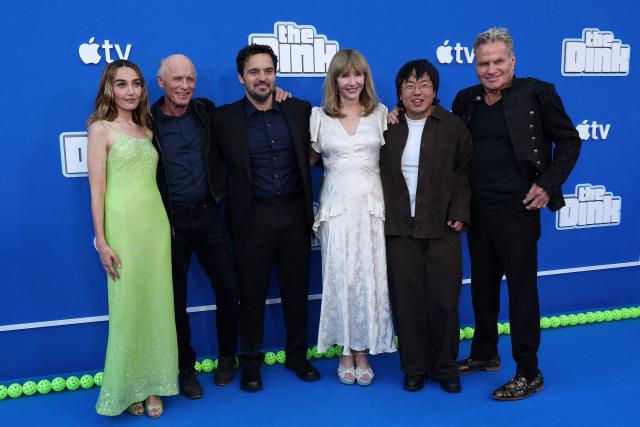 (L/R) US actress Chloe Fineman, US actor Ed Harris, US actor Jake Johnson, US actress Mary Steenburgen, Australian actor Aaron Chen and US actor Martin Kove attend the premiere of Apple Original Films' "The Dink" at the AMC Century City theatre in Los Angeles on July 20, 2026. (Photo by VALERIE MACON / AFP)