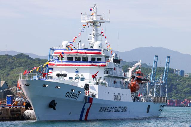 The Taiwan coast guard 1,000-ton class vessel Penghu (CG1007) is seen during the ship's delivery ceremony at the port in Keelung on July 21, 2026. (Photo by I-Hwa Cheng / AFP)
