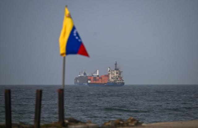Two cargo ships head toward the port of La Guaira in Catia La Mar, Venezuela, on July 20, 2026. (Photo by Juan BARRETO / AFP)