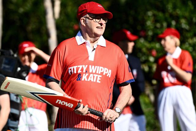 Australian Prime Minister Anthony Albanese prepares to bat during a charity backyard cricket match at Kirribilli House in Sydney on July 21, 2026. (Photo by DAN HIMBRECHTS / POOL / AFP)