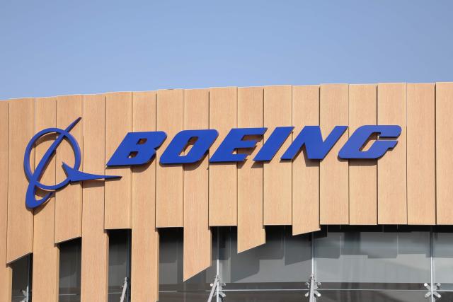 Signage for US plane maker Boeing is pictured on the second day of the Farnborough International Airshow 2026 in Farnborough, south-west of London, on July 21, 2026. (Photo by Toby Shepheard / AFP)