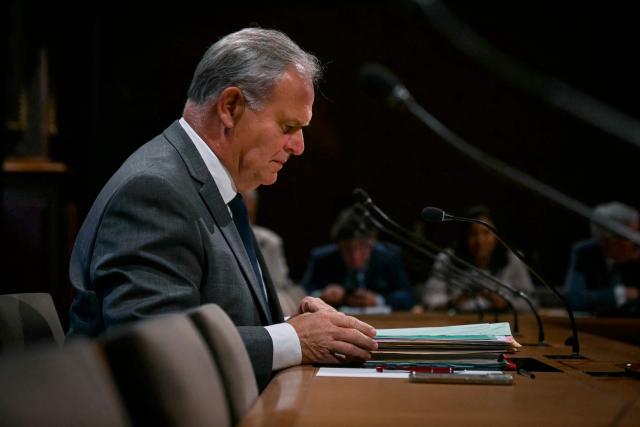 François-Noel Buffet waits before his hearing following his candidacy proposed by the French President for Human Rights Defender, at the Senate in Paris on July 21, 2026. (Photo by Lou BENOIST / AFP)