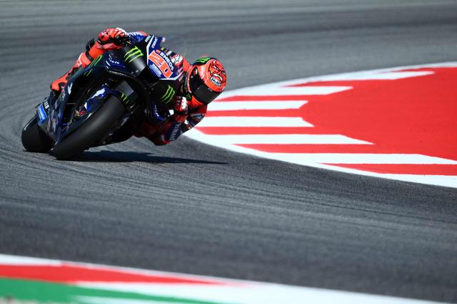 (FILES) Team Monster Energy Yamaha MotoGP's Fabio Quartararo rides during the second free practice session at the Catalunya Moto GP Grand Prix at the Catalunya racetrack in Montmelo, near Barcelona, on May 16, 2026. French MotoGP rider Fabio Quartararo, the 2021 world champion, has signed with Honda for two seasons, the Japanese team announced on July 21, 2026, as had been expected for several weeks. (Photo by JOSE JORDAN / AFP)