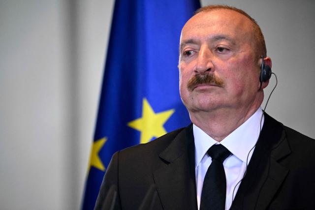 Azerbaijan's President Ilham Aliev looks on during a joint press conference with the German Chancellor after a meeting at the Chancellery in Berlin on July 21, 2026. (Photo by Tobias SCHWARZ / AFP)