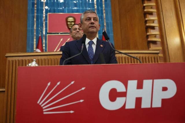 (FILES) Ousted leader of Turkey's main opposition party, Republican People's Party (CHP), Ozgur Ozel (C, front) delivers a speech at the Turkish Grand National Assembly (TBMM) in Ankara on June 9, 2026. Turkey's ousted opposition leader Ozgur Ozel, who had led the Republican People's Party (CHP) said on July 21, 2026, he would form a new party after a court ruling removed him from his post. (Photo by Adem ALTAN / AFP)