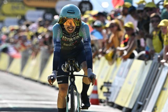 Bahrain - Victorious team's French rider Lenny Martinez  cycles to the finish line of the 16th stage of the 113th edition of the Tour de France cycling race, 26 km between Évian-les-Bains and Thonon-les-Bains in the French Alps, on July 21, 2026. (Photo by Jeff PACHOUD / AFP)