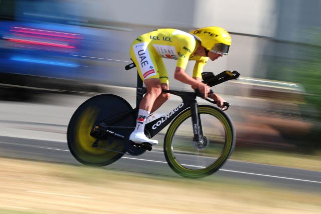 UAE Team Emirates - XRG's Slovenian rider Tadej Pogacar cycles during the 16th stage of the 113th edition of the Tour de France cycling race, 26,1 km time trial between Évian-les-Bains and Thonon-les-Bains in the French Alps, on July 21, 2026. (Photo by Anne-Christine POUJOULAT / AFP)