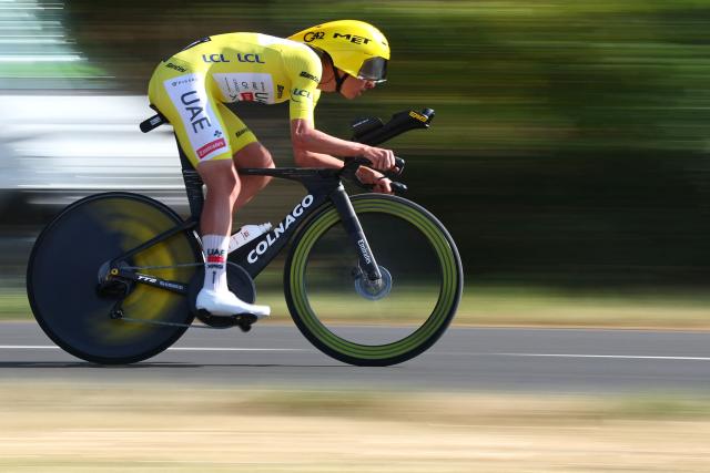 TOPSHOT - UAE Team Emirates - XRG's Slovenian rider Tadej Pogacar cycles during the 16th stage of the 113th edition of the Tour de France cycling race, 26,1 km time trial between Évian-les-Bains and Thonon-les-Bains in the French Alps, on July 21, 2026. (Photo by Anne-Christine POUJOULAT / AFP)