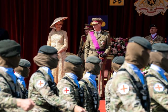 Queen Mathilde of Belgium and King Philippe of Belgium (C) attend the military and civilian parade on Belgium's National Day, in Brussels on July 21, 2026. (Photo by Marius BURGELMANS / Belga / AFP) / Belgium OUT