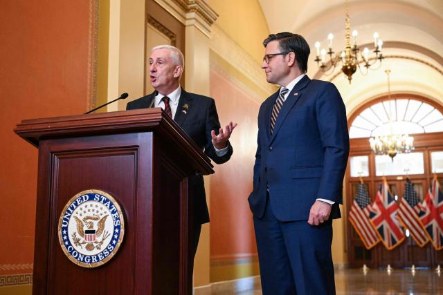 US Speaker of the House Mike Johnson (R) looks on as Sir Lindsay Hoyle, Speaker of the UK House of Commons, speaks to the press at the US Capitol in Washington, DC on July 21, 2026. (Photo by Alex WROBLEWSKI / AFP)