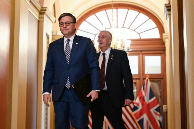 (L/R) US Speaker of the House Mike Johnson and Sir Lindsay Hoyle, Speaker of the UK House of Commons, arrive to speak to the press following their meeting at the US Capitol in Washington, DC on July 21, 2026. (Photo by Alex WROBLEWSKI / AFP)