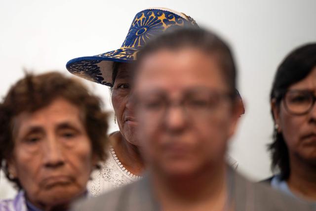 Relatives and victims of crimes committed by the Peruvian state attend a press conference under the slogan "All the victims, one voice" in Lima on July 21, 2026, bringing together victims and relatives of the internal armed conflict (1980-2000), the 2020 social protests, the 2022-2023 massacres and cases of alleged state violence in 2025-2026. (Photo by Ernesto BENAVIDES / AFP)