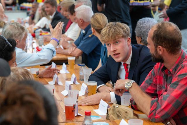 Belgium's Prince Emmanuel (2R) attends the "Everyone to the Table" event to celebrate Belgium's National Day at Place du Jeu de Balle in Brussels on July 21, 2026. (Photo by JONAS ROOSENS / Belga / AFP) / Belgium OUT