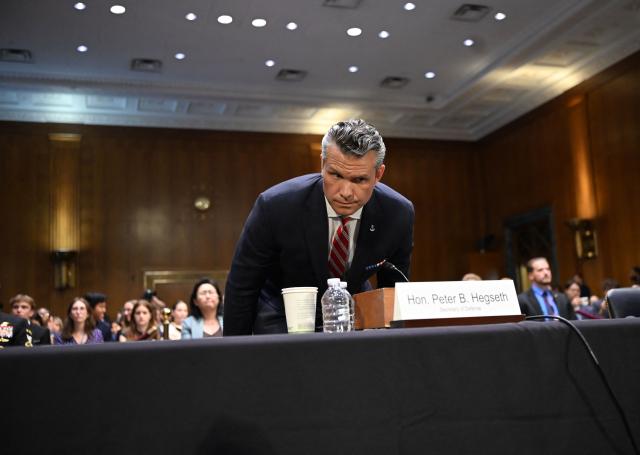 US Defense Secretary Pete Hegseth arrives to testify during a Senate Committee on Appropriations hearing on Capitol Hill in Washington, DC on July 21, 2026. US lawmakers are conducting a hearing to examine a review of US President Donald Trump's supplemental funding request of June 24, 2026. (Photo by Alex WROBLEWSKI / AFP)