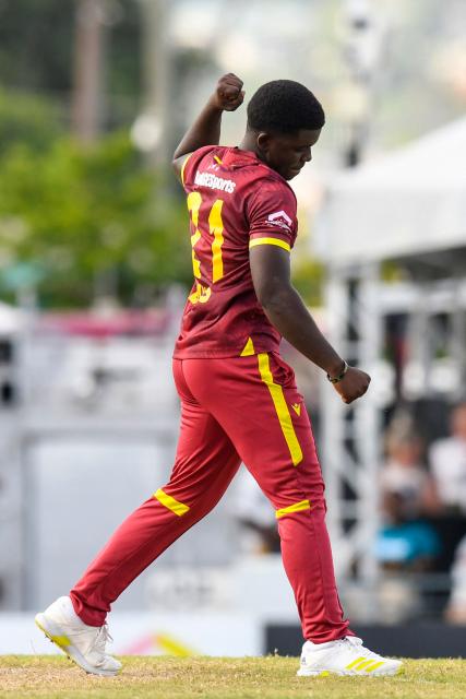 Bowler Vitel Lawes of West Indies celebrates after taking the wicket of opening batsman Will Young of New Zealand during the fifth and final one day international (ODI) cricket match between West Indies and New Zealand at Kensington Oval in Bridgetown, Barbados on July 21, 2026. (Photo by Randy Brooks / AFP)