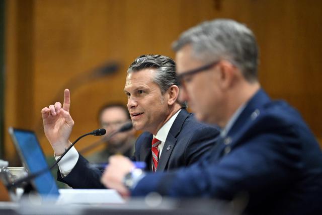 US Defense Secretary Pete Hegseth testifies alongside the Chairman of the Joint Chiefs of Staff Gen. Dan Caine (R) during a Senate Committee on Appropriations hearing on Capitol Hill in Washington, DC on July 21, 2026. US lawmakers are conducting a hearing to examine a review of US President Donald Trump's supplemental funding request of June 24, 2026. (Photo by Alex WROBLEWSKI / AFP)