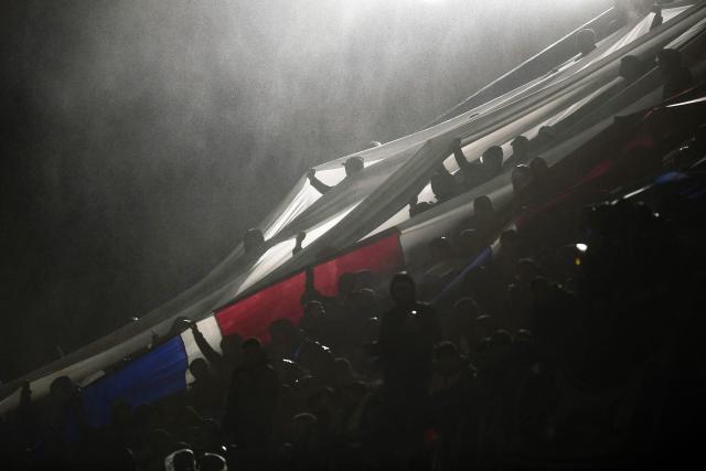 Nacional fans cheer for their team ahead of the first leg of the Copa Sudamericana knockout round play-off football match between Uruguay's Nacional and Argentina's Tigre at the Gran Parque Central satdium in Montevideo, on July 21, 2026. (Photo by Dante FERNANDEZ / AFP)