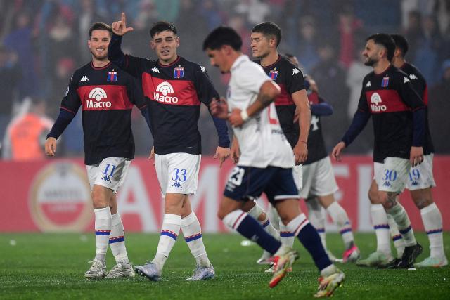 Tigre's midfielder #33 Elias Cabrera celebrates after scoring the team's third goal during the first leg of the Copa Sudamericana knockout round play-off football match between Uruguay's Nacional and Argentina's Tigre at the Gran Parque Central satdium in Montevideo, on July 21, 2026. (Photo by Dante FERNANDEZ / AFP)