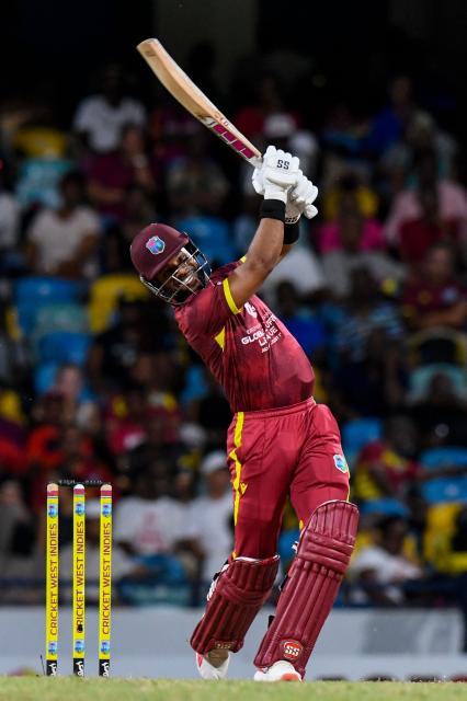 Shai Hope of West Indies hits six during the fifth and final one day international (ODI) cricket match between West Indies and New Zealand at Kensington Oval in Bridgetown, Barbados on July 21, 2026. (Photo by Randy Brooks / AFP)