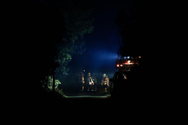 Firefighters battle a wildfire near Cotignac, southeastern France, on July 22, 2026. A wildfire advancing at surprising speed in southern France forced the evacuation of nearly 400 people from several villages on July 21, 2026, the top official for the Var region said. The evacuations took place around the villages of Cotignac, Montfort-sur-Argens and Correns, and some 1,700 hectares (4,200 acres) have already burned, the official added. (Photo by Thibaud MORITZ / AFP)