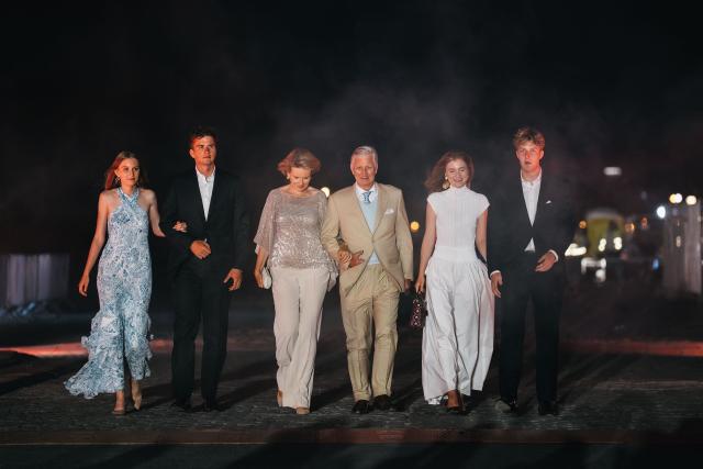 King Philippe - Filip of Belgium (3rd R), Queen Mathilde of Belgium (3rd L), Crown Princess Elisabeth (2nd R), Princess Eleonore (L), Prince Gabriel (2nd L) and Prince Emmanuel (R) attend the celebrations of the Belgian National Day at the Parc du Cinquantenaire in Brussels on July 21, 2026. (Photo by Marius BURGELMANS / Belga / AFP) / Belgium OUT