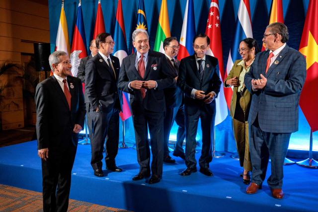 New Zealand'S Foreign Minister Winston Peters (3rd L) walks off the stage after posing for a group photo with ASEAN foreign ministers during the ASEAN Post-Ministerial Conference with New Zealand on the sidelines of the ASEAN Foreign Ministers' Meeting at the Philippine International Convention Center in Pasay, Metro Manila on July 22, 2026. (Photo by Ezra Acayan / POOL / AFP)