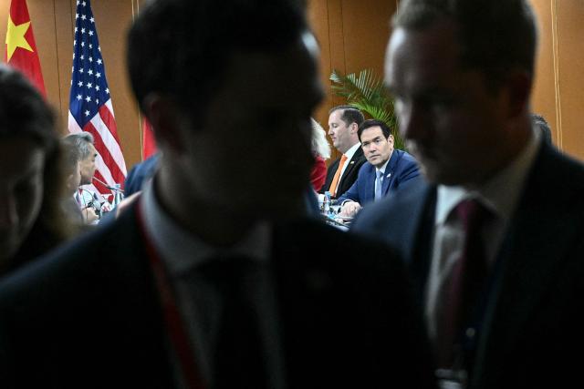 US Secretary of State Marco Rubio (C) looks on during a bilateral meeting with China's Foreign Minister Wang Yi on the sidelines of the Association of Southeast Asian Nations (ASEAN) Foreign Ministers' Meeting in Pasay, Metro Manila on July 22, 2026. (Photo by Brendan SMIALOWSKI / POOL / AFP)