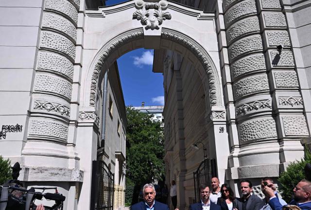 Former Hungarian Prime Minister Viktor Orban of the FIDESZ party holds a press conference in front of the party headquarters, on July 22, 2026 in Budapest, one day after prosecutors had launched a raid on the FIDESZ party's data servers. On July 21, 2026 The Fidesz party of Hungary's nationalist ex-leader Viktor Orban, which was swept from power in elections in April, said on that prosecutors had launched a raid on its data servers. Since ending Orban's hardline 16-year-long rule, the new Prime Minister's new pro-European conservative government has rushed to loosen the self-styled "illiberal" leader's lingering grip on the central European country. (Photo by Attila KISBENEDEK / AFP)