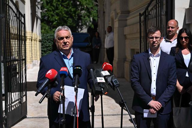 Former Hungarian Prime Minister Viktor Orban of the FIDESZ party holds a press conference in front of the party headquarters, on July 22, 2026 in Budapest, one day after prosecutors had launched a raid on the FIDESZ party's data servers. On July 21, 2026 The Fidesz party of Hungary's nationalist ex-leader Viktor Orban, which was swept from power in elections in April, said on that prosecutors had launched a raid on its data servers. Since ending Orban's hardline 16-year-long rule, the new Prime Minister's new pro-European conservative government has rushed to loosen the self-styled "illiberal" leader's lingering grip on the central European country. (Photo by Attila KISBENEDEK / AFP)