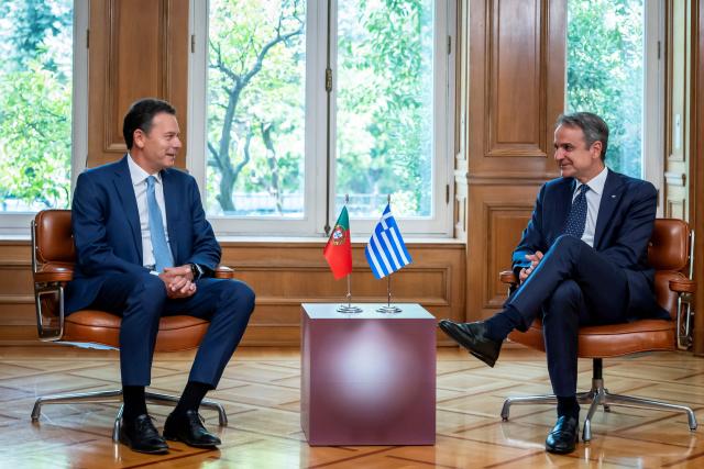Greece's Prime Minister Kyriakos Mitsotakis (L) meets with Portugal's Prime Minister Luis Montenegro, in Athens on July 22, 2026. (Photo by Aris MESSINIS / AFP)